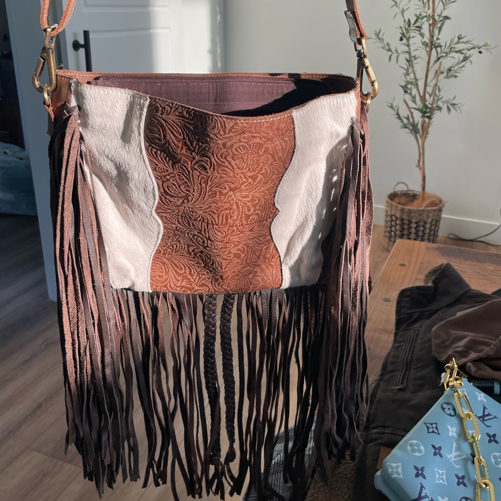 Genuine leather and calf hide purse with fringe. Conceal carry purse